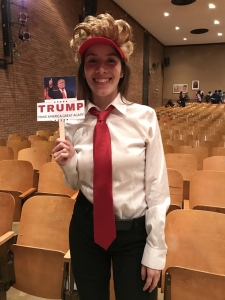 AnaMarie Martinez poses as Donald Trump in the Mock Debate